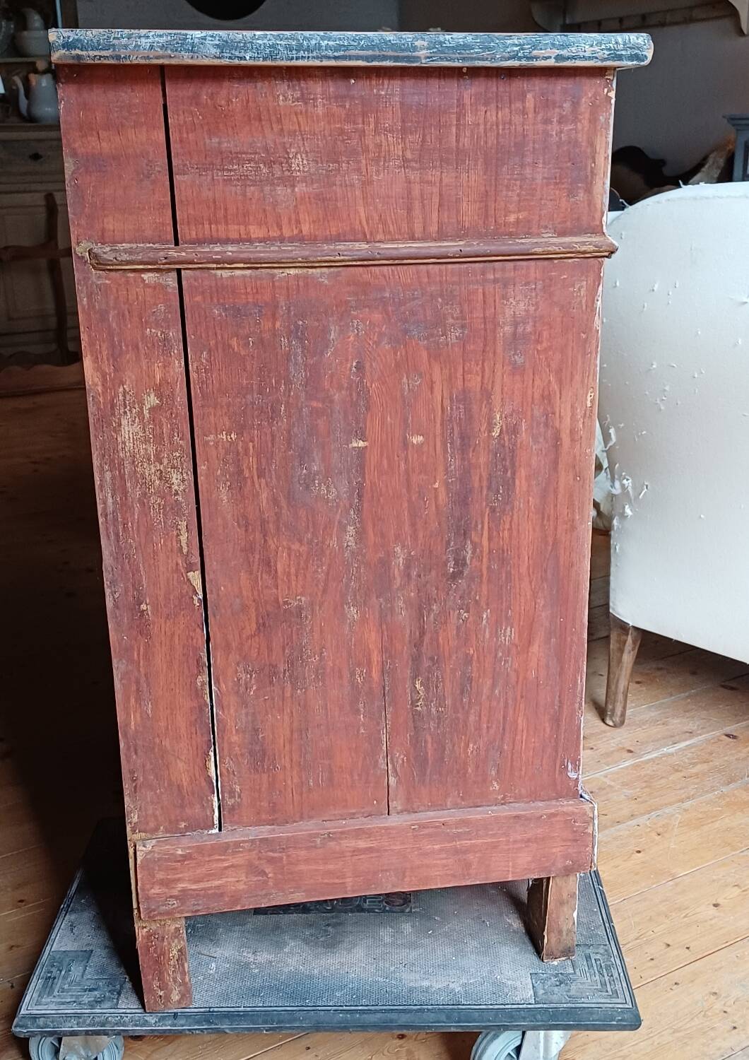 Antique piece of furniture with a grey patina.