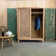 Vintage sliding wardrobe in raw oak