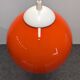 Orange opaline ball pendant, France circa 1970.