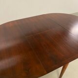 Table à manger ronde en palissandre extensible des années 1960 MidCentury