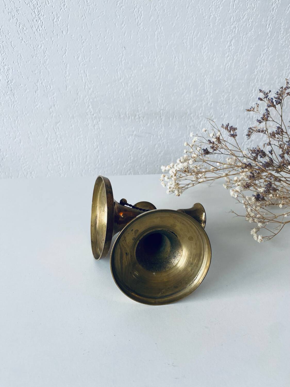 Pair of brass cord candle holders