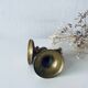 Pair of brass cord candle holders