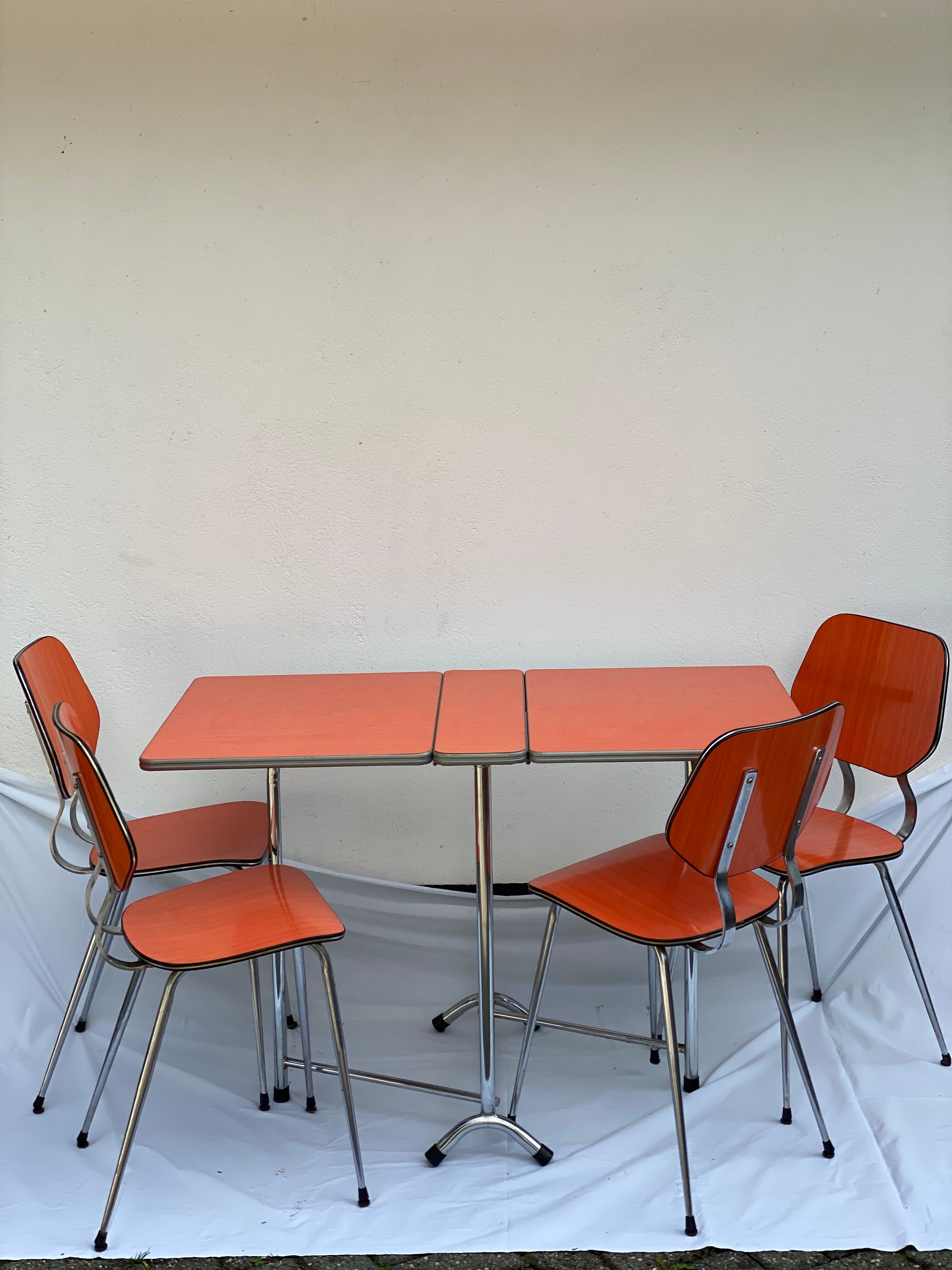 Orange formica table and 4 chairs
