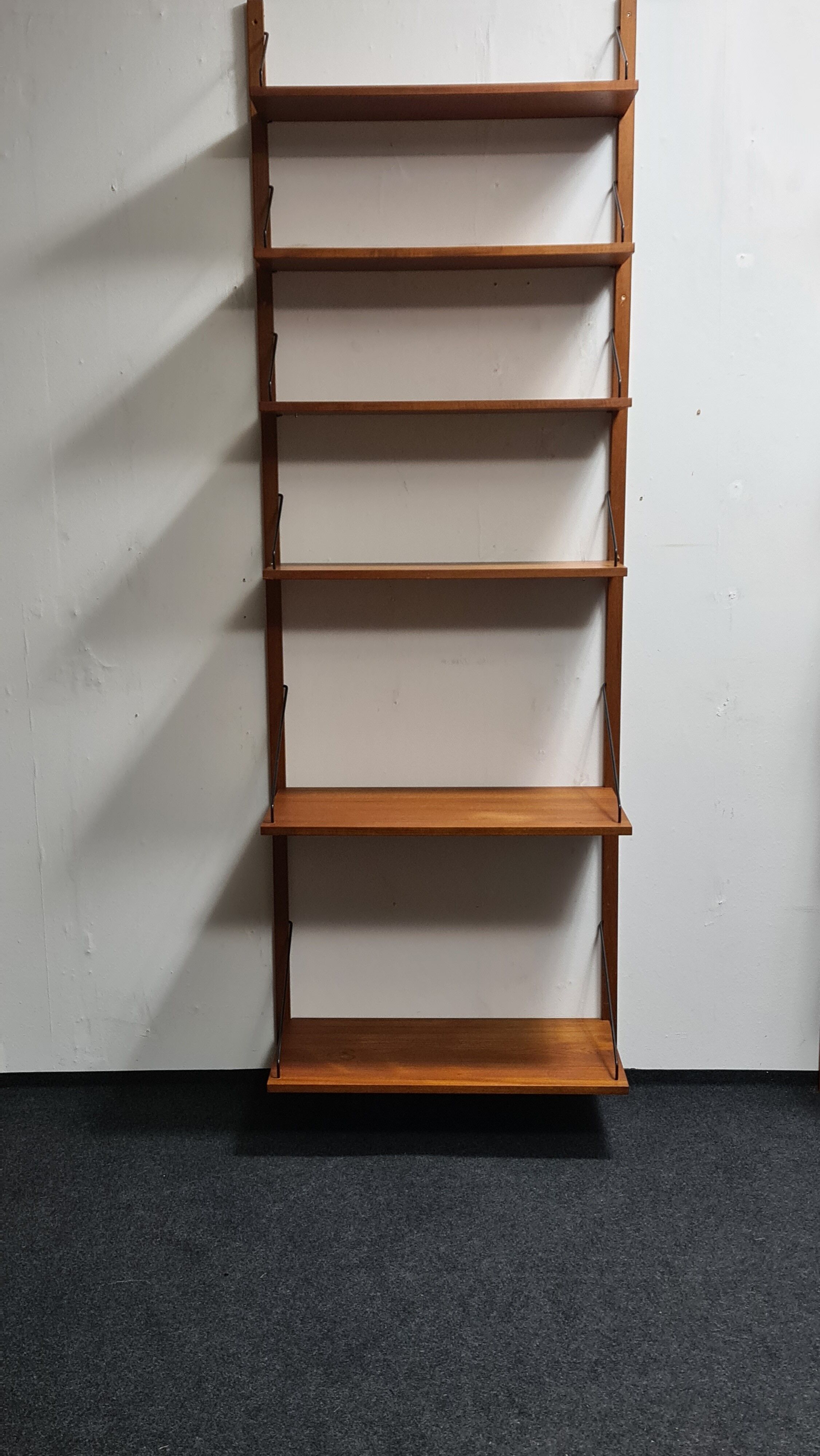 Vintage teak shelving by Poul Cadovious
