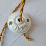 Suspension in green and white enamelled sheet metal