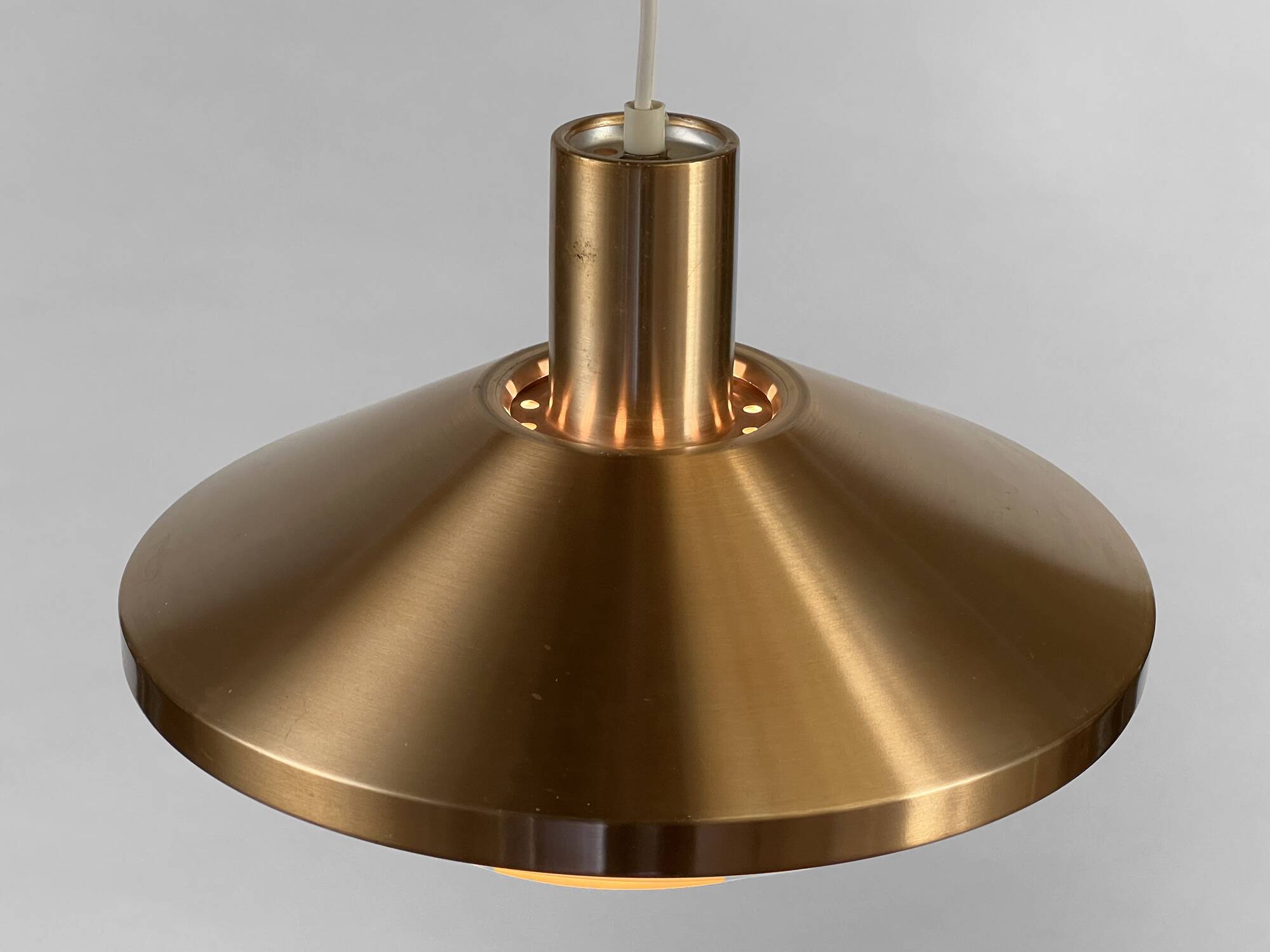 Copper colored aluminum pendant light from Lyskaer belysning. Denmark 1970s