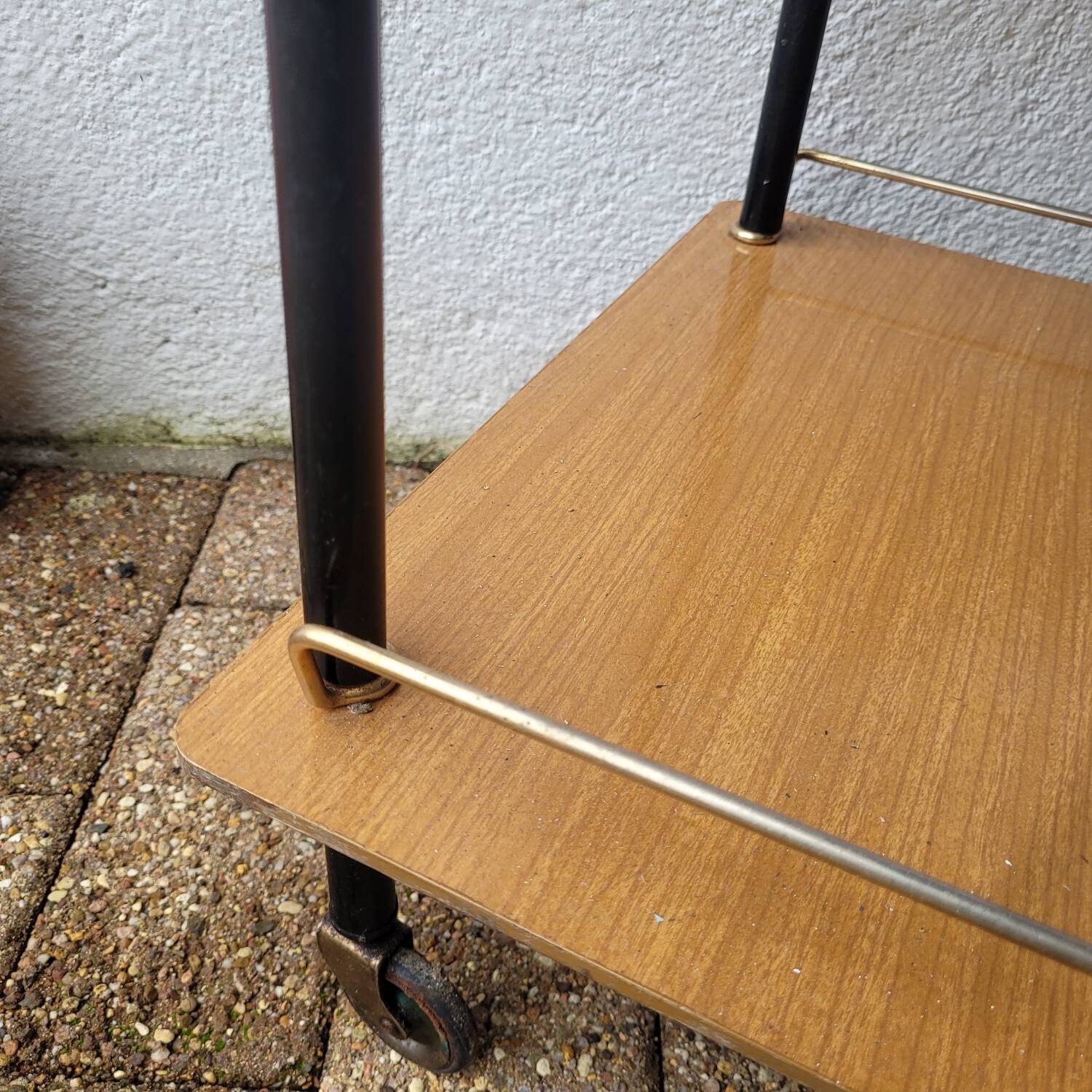 Rolling dessert trolley in formica – black tubular structure, 1960s.