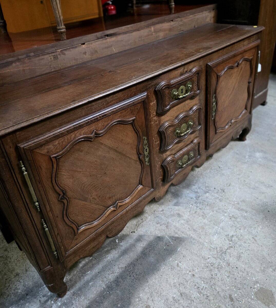 Louis XV oak buffet in enfilade style.