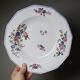 Service of 28 pieces Bernardaud Limoges porcelain with floral decoration from the 1920s to 1950s.