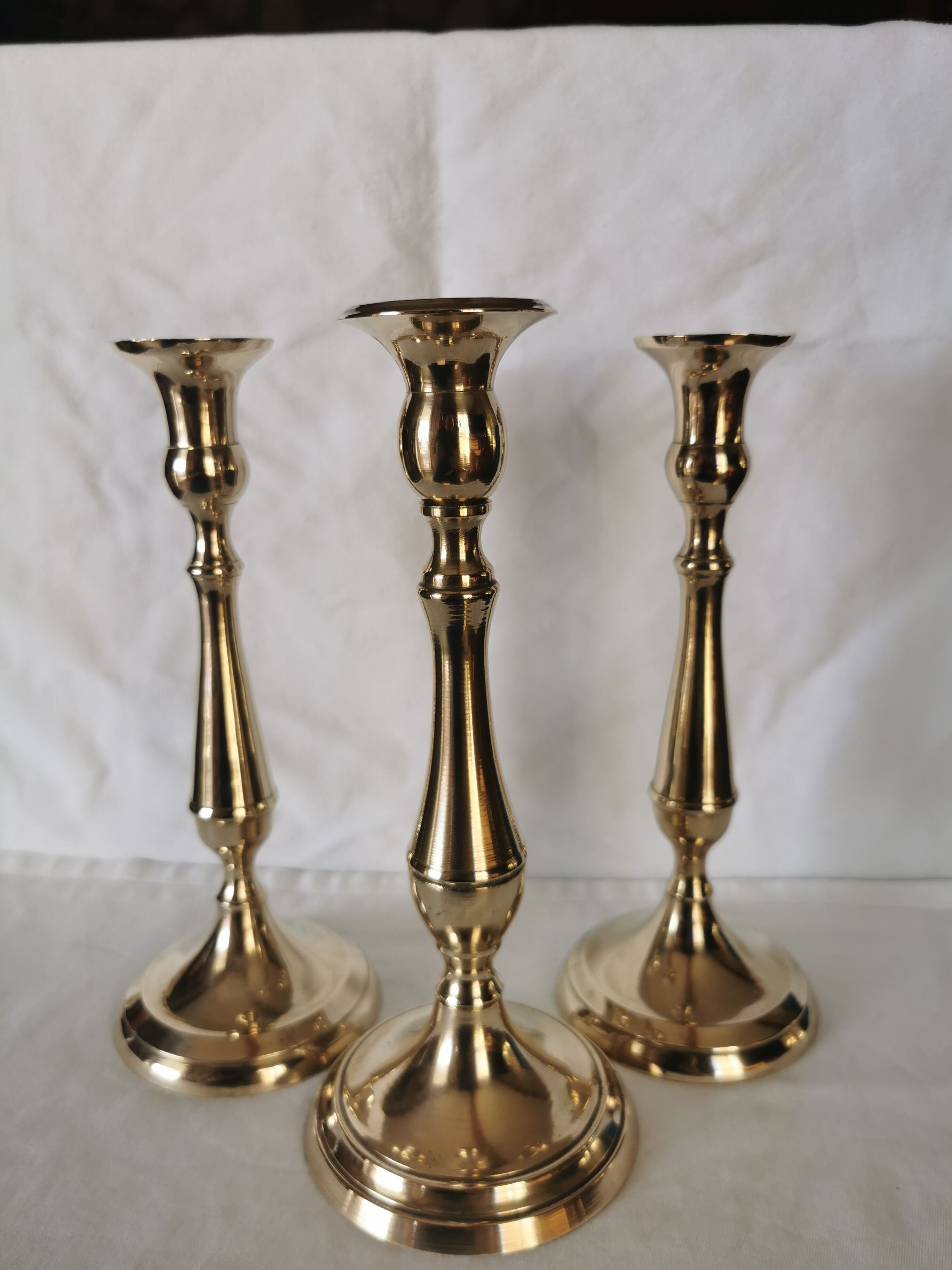 3 Old candle holders in solid golden brass
