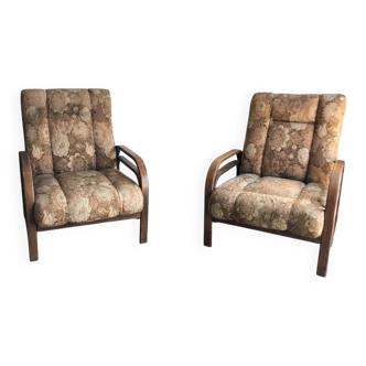 Pair of Art Deco armchairs from the 1930s in brown fabric and carved wood — vintage style