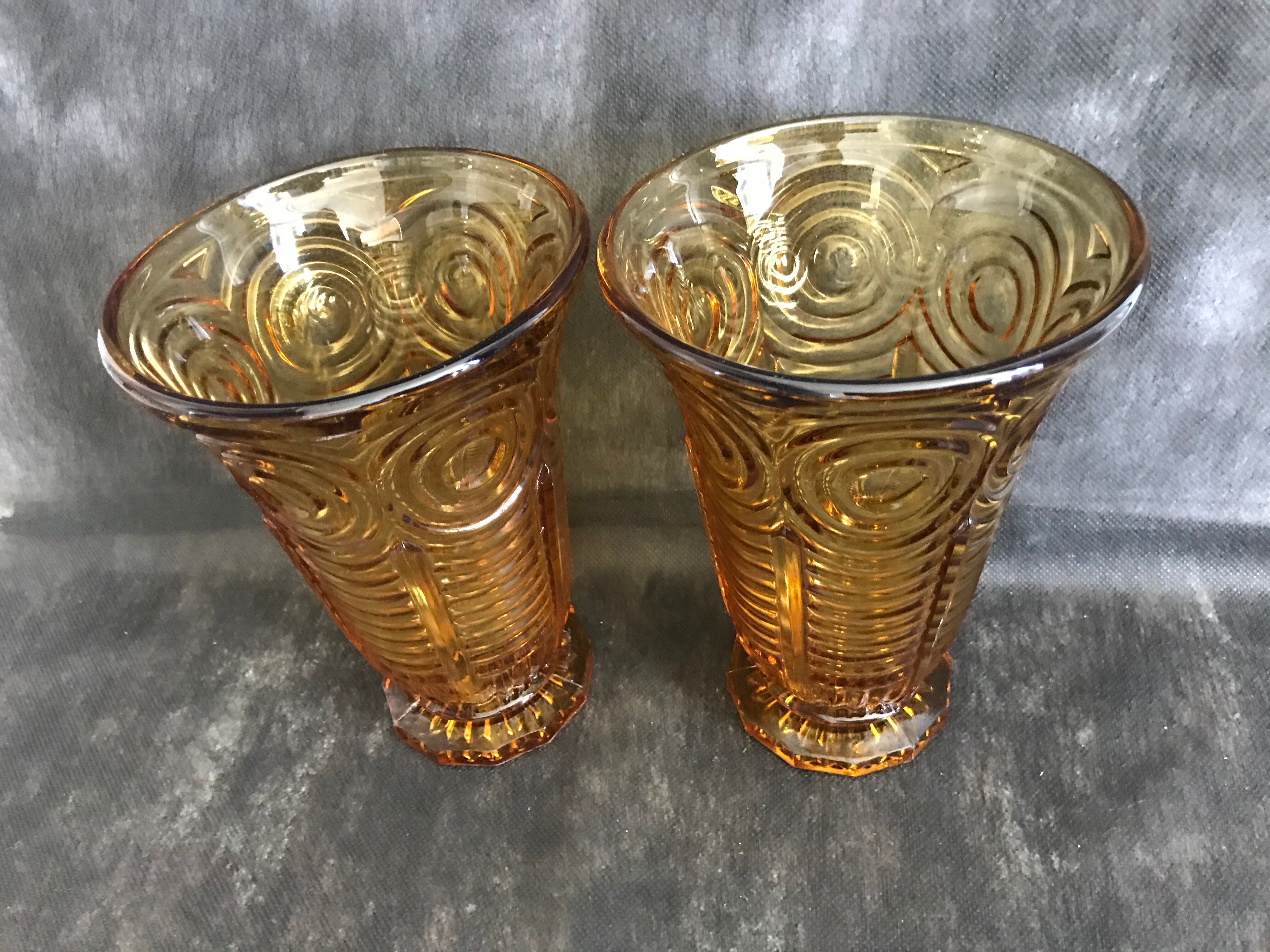 2 moulded pressed glass vases