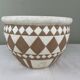 Cache pot vintage graphique