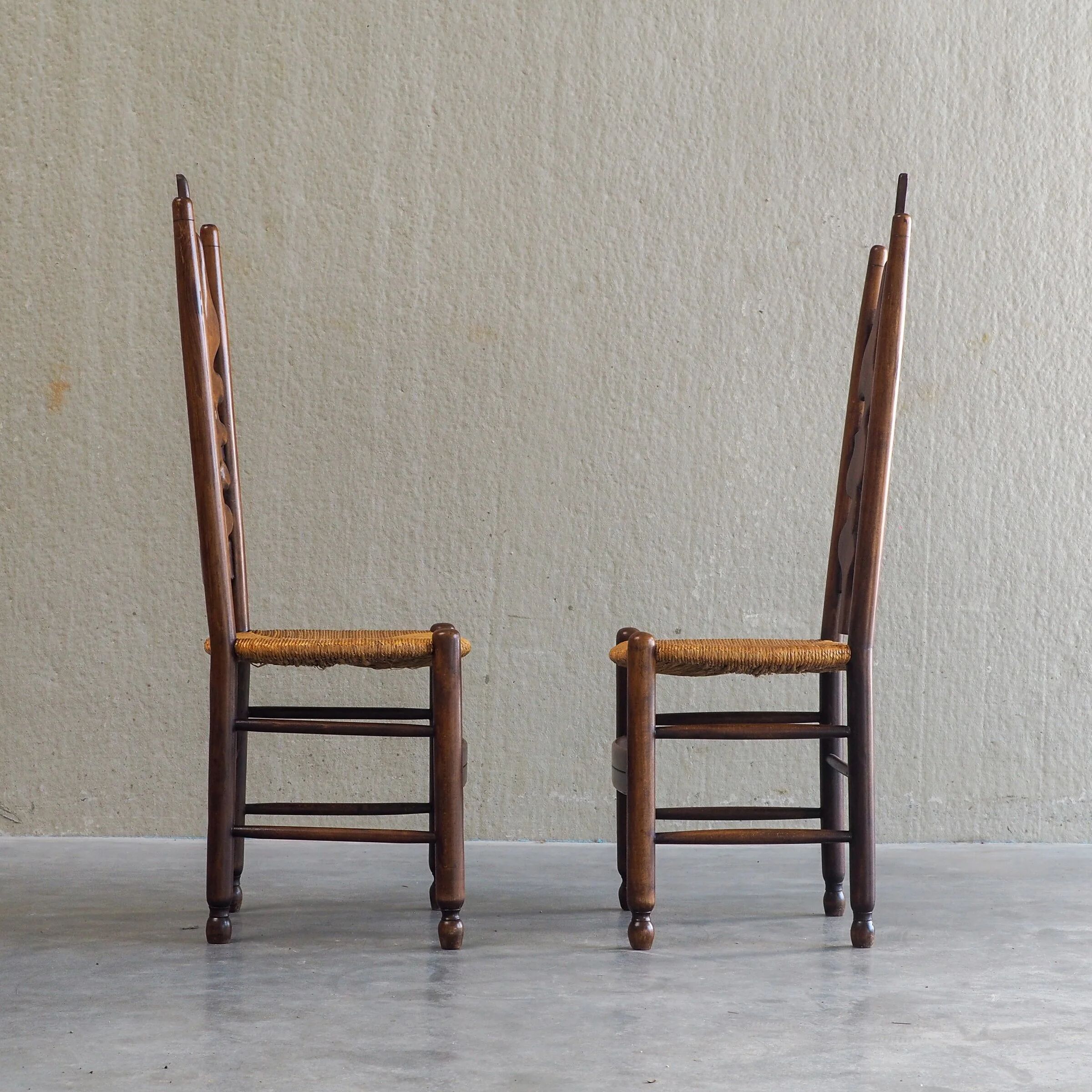 2 sculptural brutalist high-back chairs