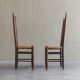 2 sculptural brutalist high-back chairs