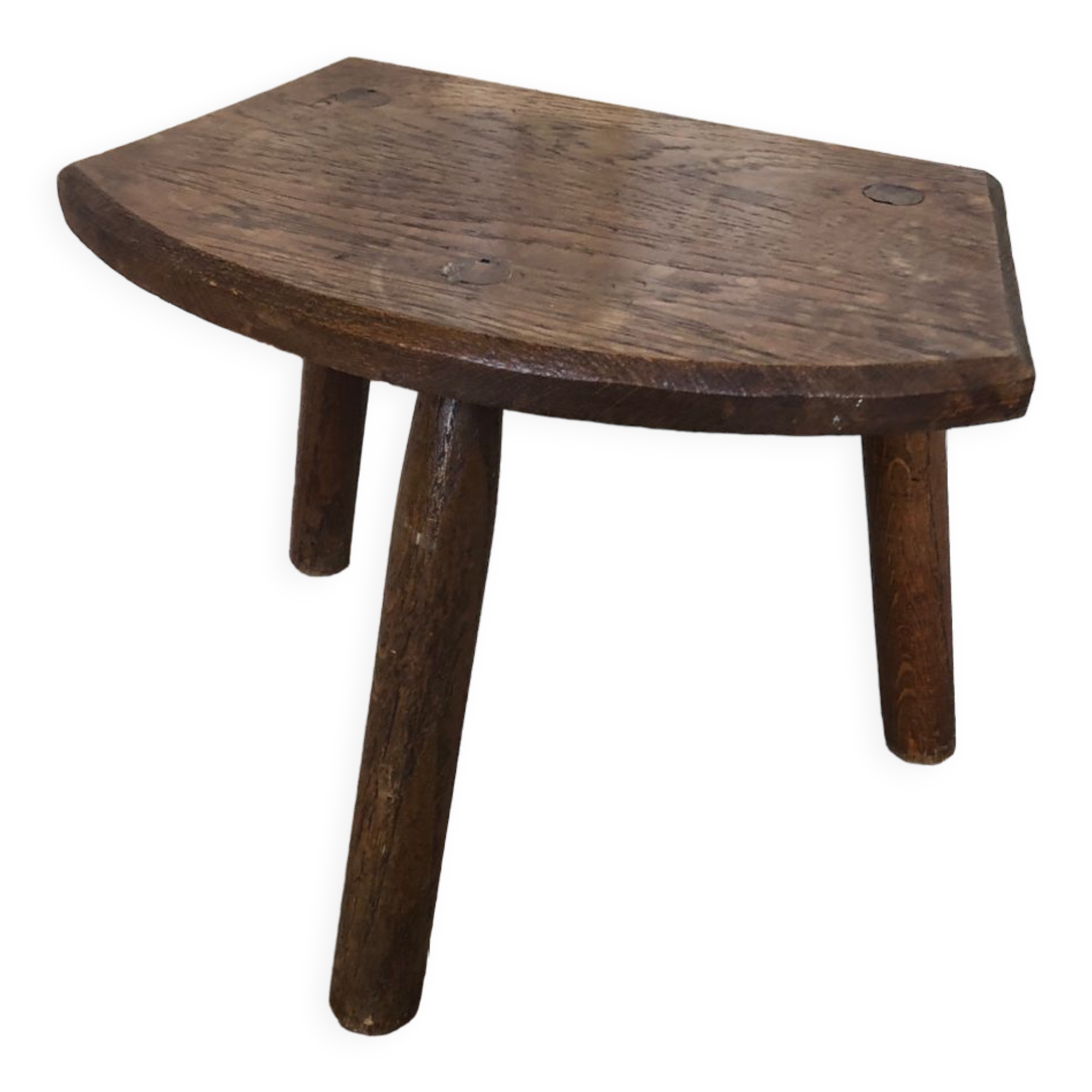 Old vintage wooden tripod milking stool