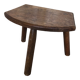 Old vintage wooden tripod milking stool