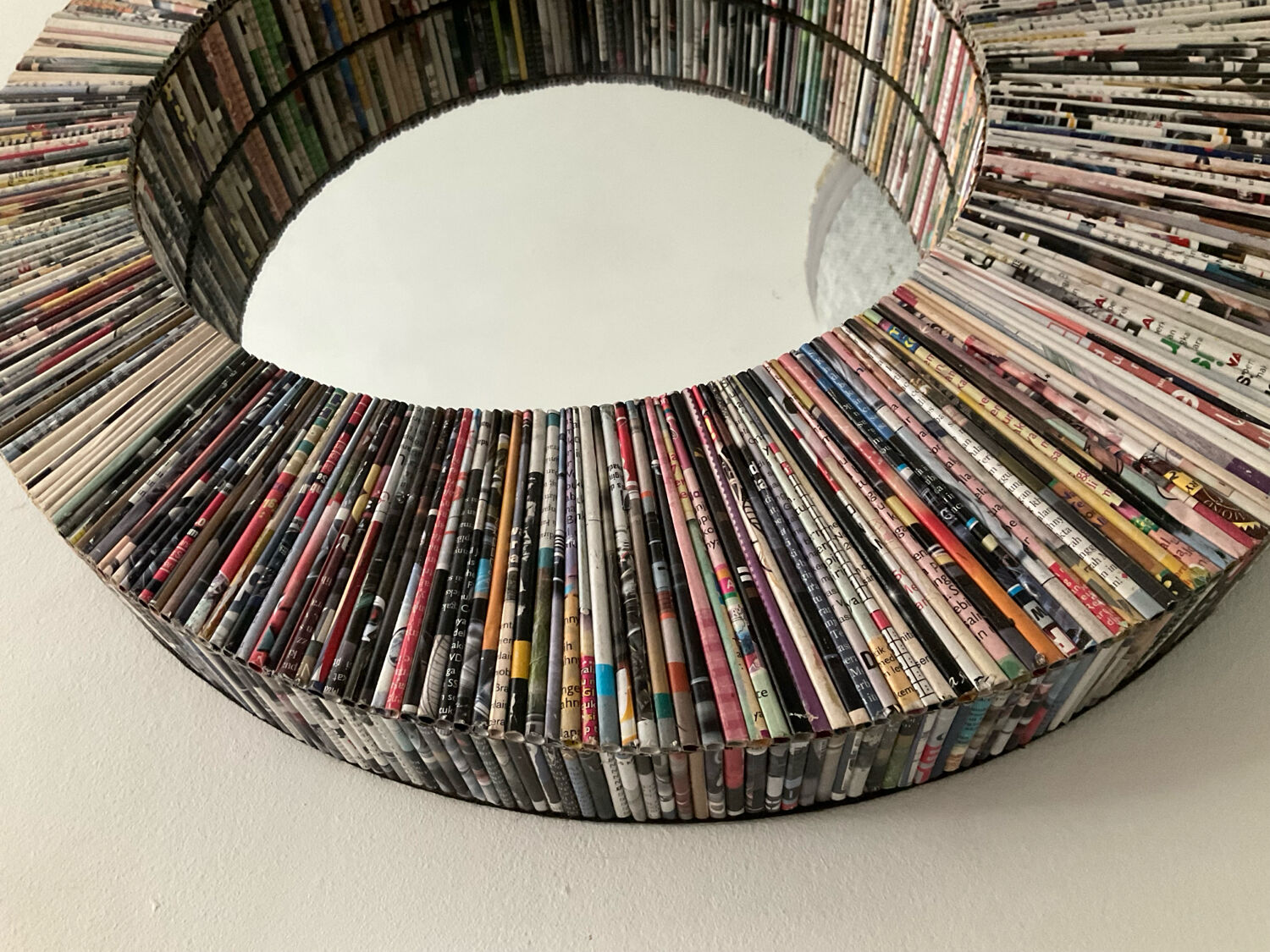 Vintage round mirror made of paper rolls