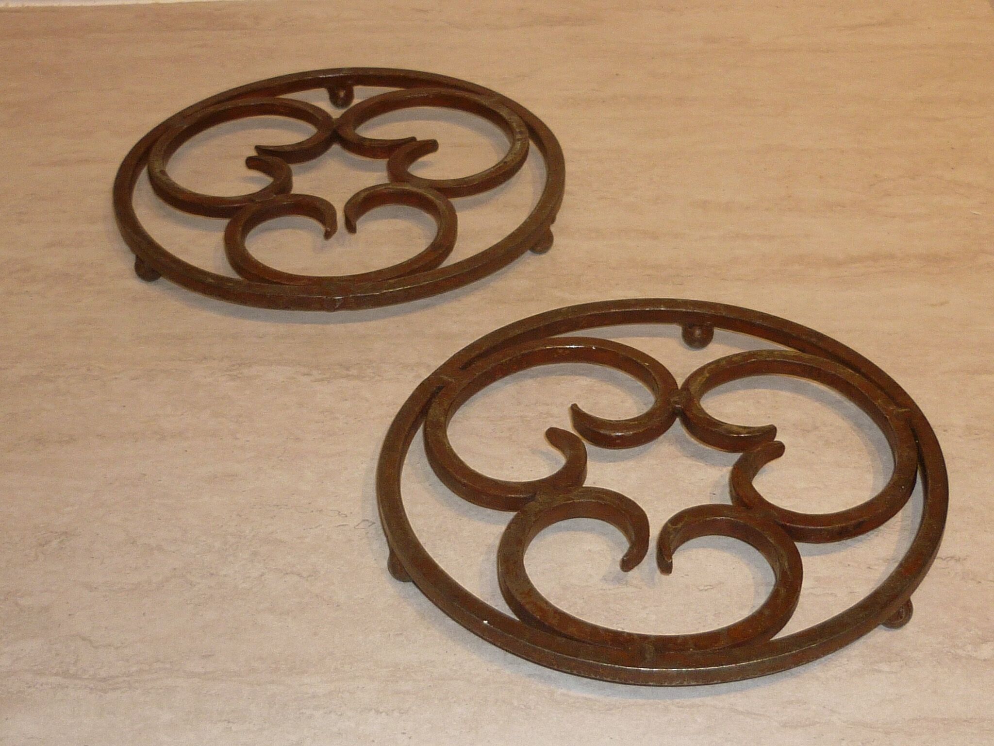 Pair of 2 wrought iron mats