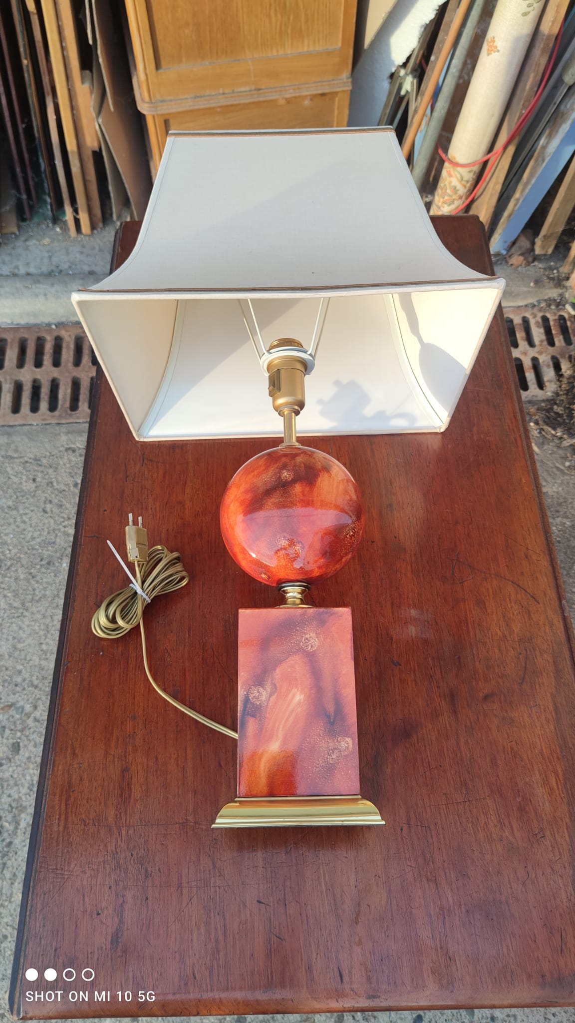 Lamp circa 1970 in iron and lacquered wood as well as bronze