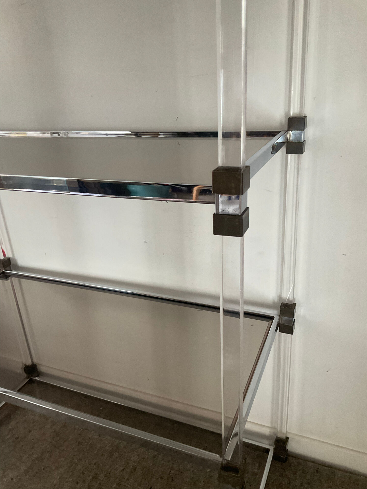 Vintage shelf in lucite, brass, and smoked glass from the 1970s.