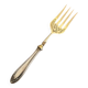 Engraved meat fork in silver and gold metal