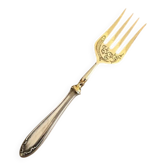 Fourchette à viande en métal argenté et doré gravé