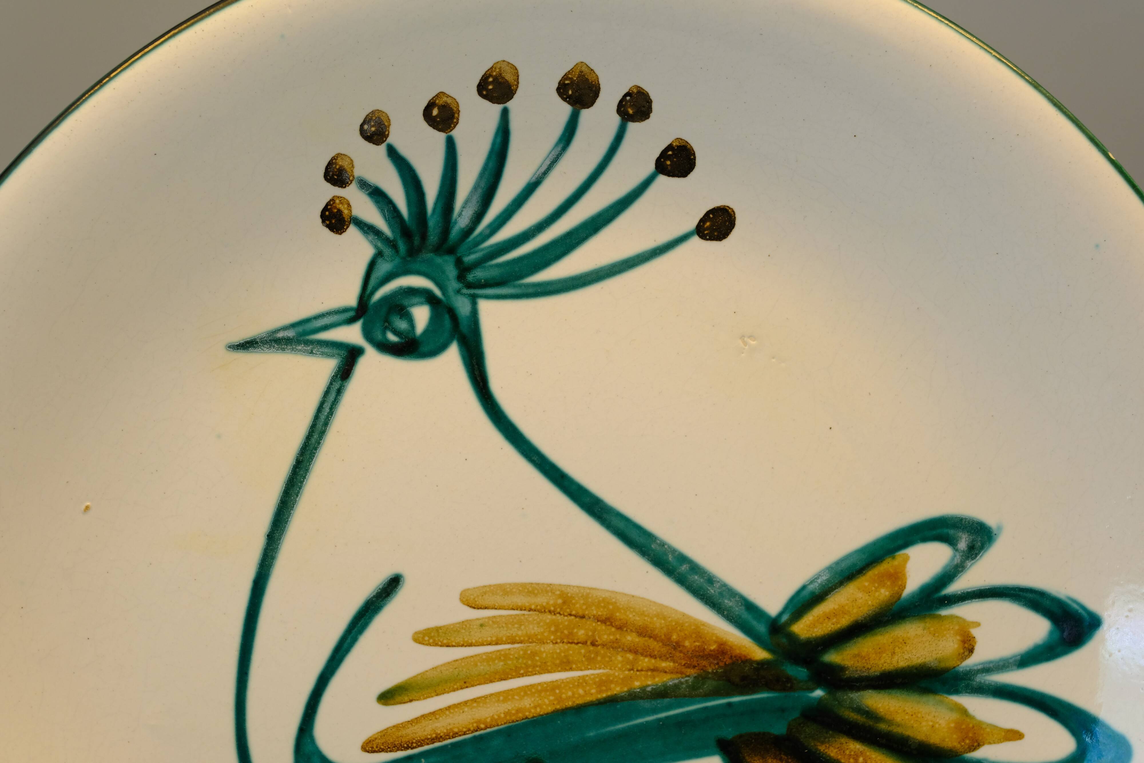 Plat à décor d'oiseau par Robert Picault 1950