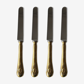 Couteaux en metal dore style Louis XV