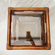 Rattan and smoked glass side table