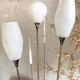 Vintage reed floor lamp in black metal and brass with three white opalines