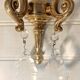 Pair of tassel sconces