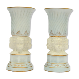 Pair of porcelain vases and biscuit
