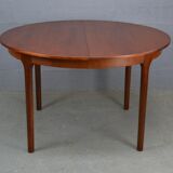 Round teak dinning table and chairs by Mctintosh