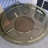 Round table in chromed metal and smoked glass