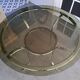 Round table in chromed metal and smoked glass