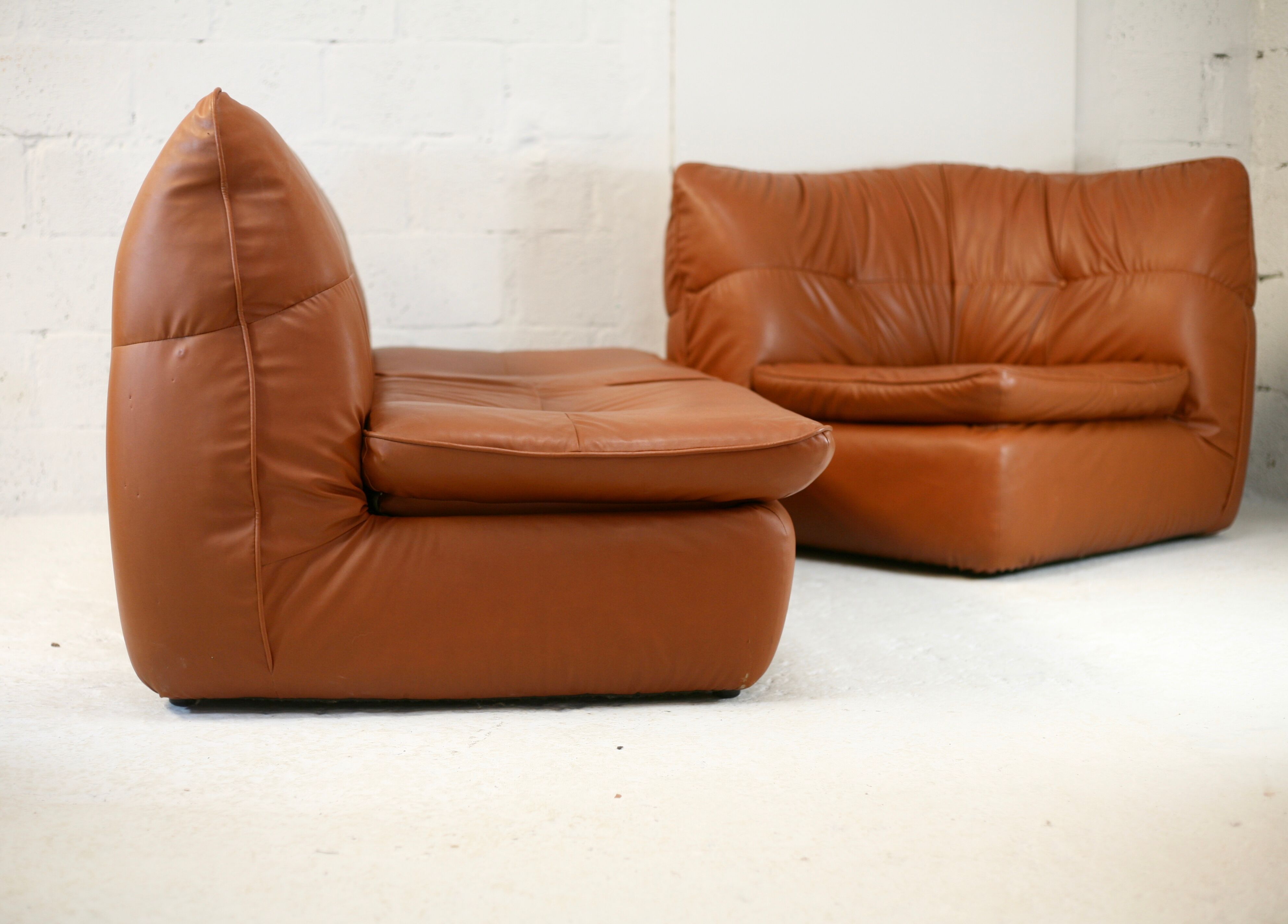 Imitation leather sofa "caramel". Convertible. France, circa 1990