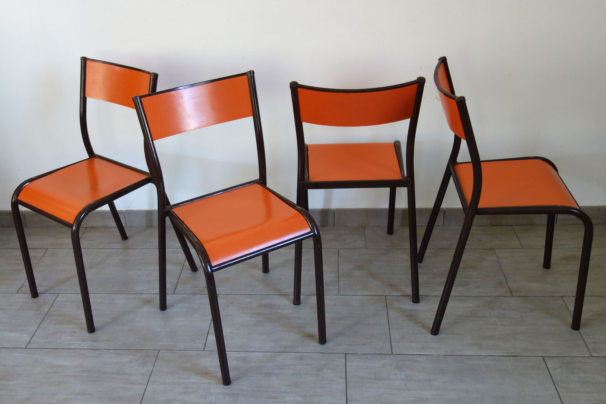 Set of 4 orange school chairs