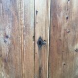 Wooden cabinet with interior doors