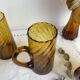 Set of 5 vintage beer glasses in amber twisted glass