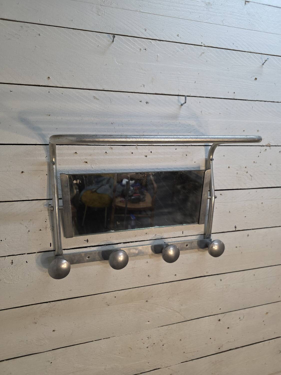 1960s swivel mirrored aluminum coat rack