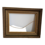 Frame with channels in wood and gilded stucco