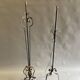 Two wrought iron lamp legs