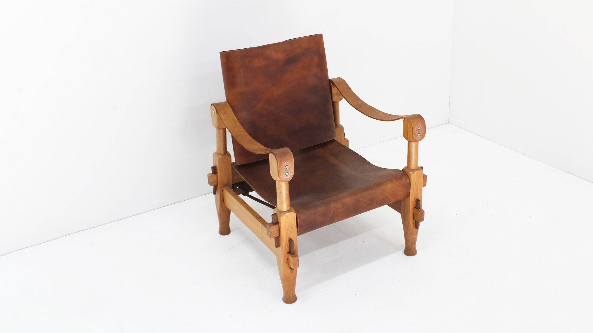 Vintage brutalist wood and cognac leather safari armchair, 1960s