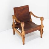 Vintage brutalist wood and cognac leather safari armchair, 1960s