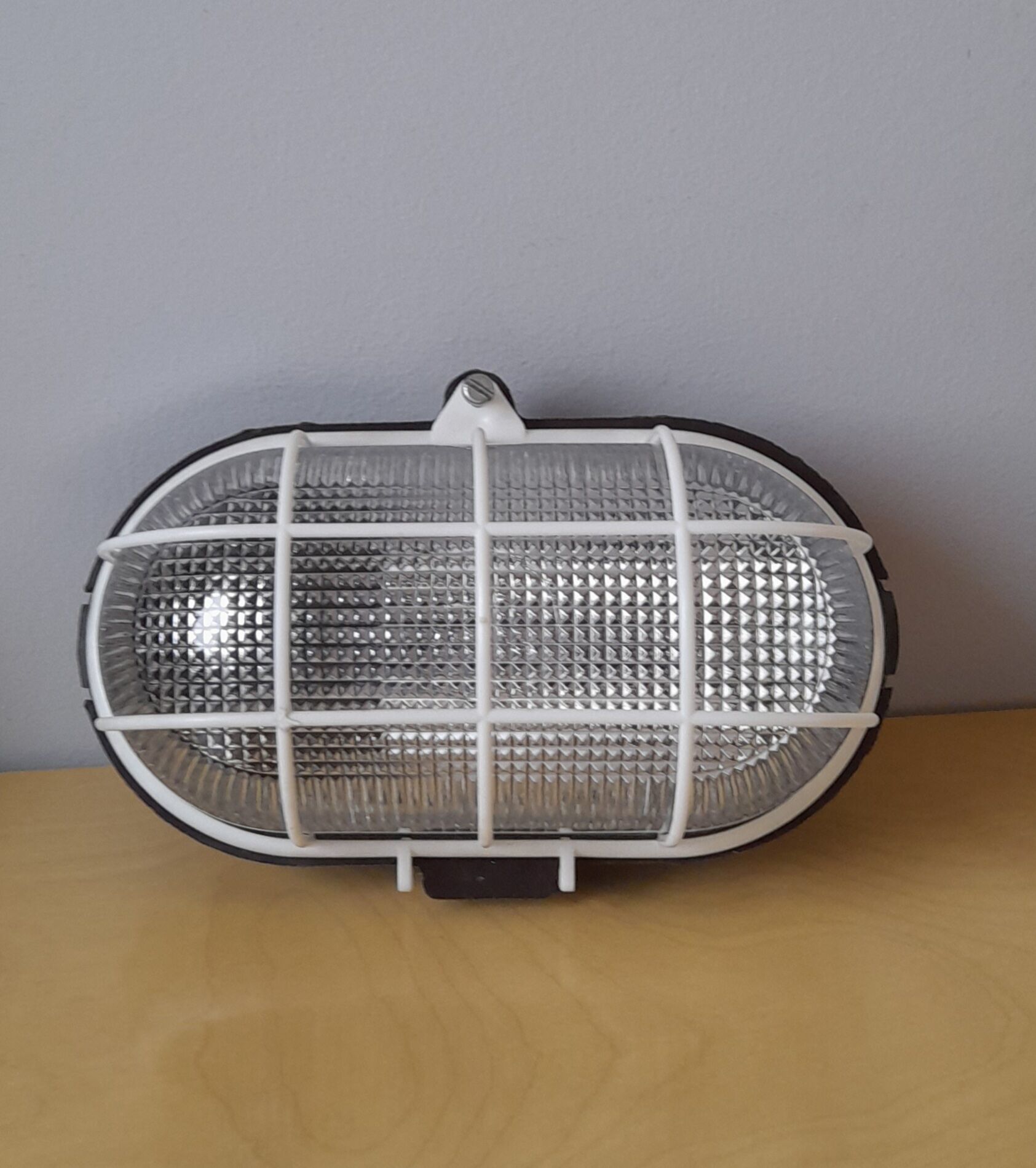 Ebonoid porthole lamp