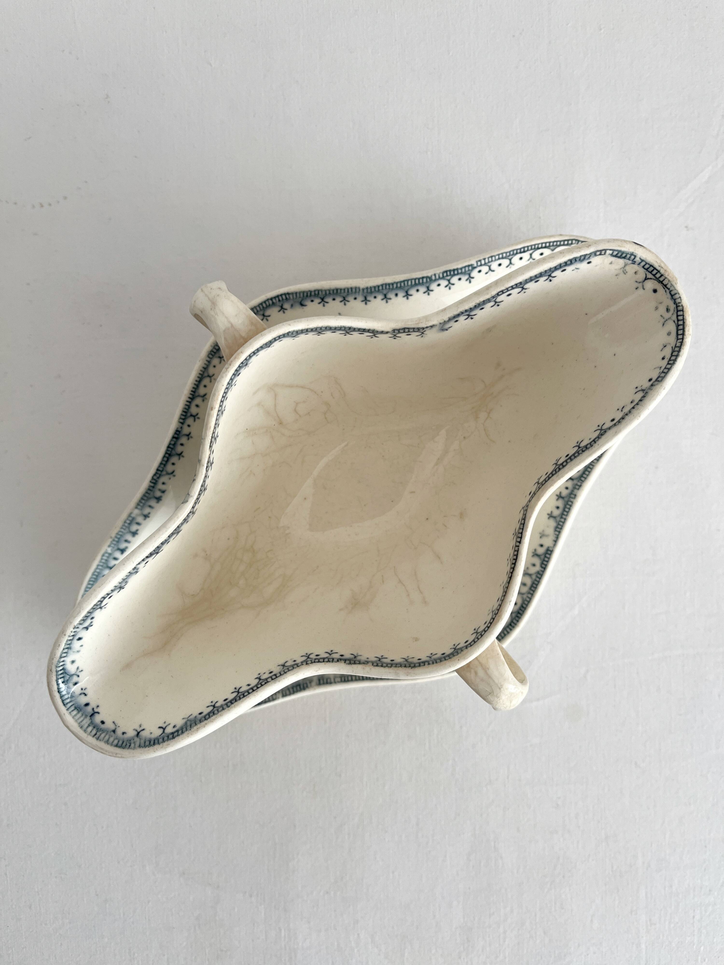 Antique iron earthenware sauceboat with flowers and birds "Malaga" Petrus Regout