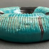 Twentieth century ceramic ashtray decorated with animals on a blue background