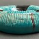 Twentieth century ceramic ashtray decorated with animals on a blue background