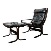 Siesta armchair and black leather ottoman by Ingmar Relling, Westnofa, Norway.